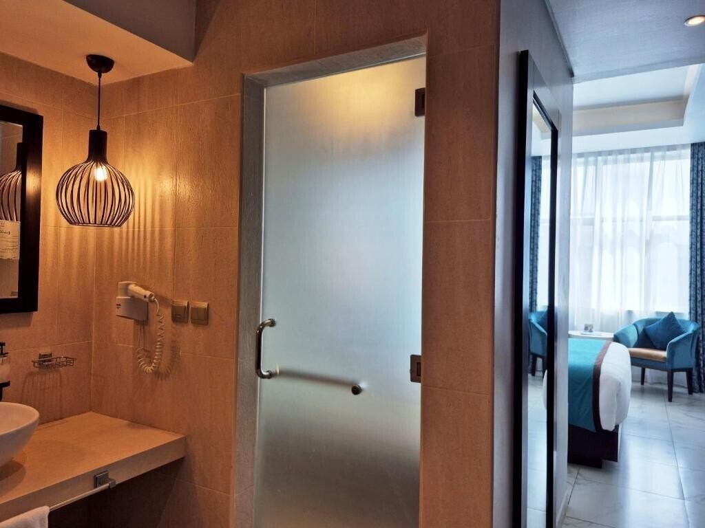 Фотография Signature Hotel Al Barsha 4*