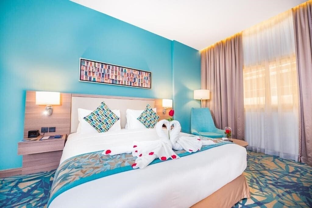 Готель Mena Plaza Hotel Al Barsha апартаменты