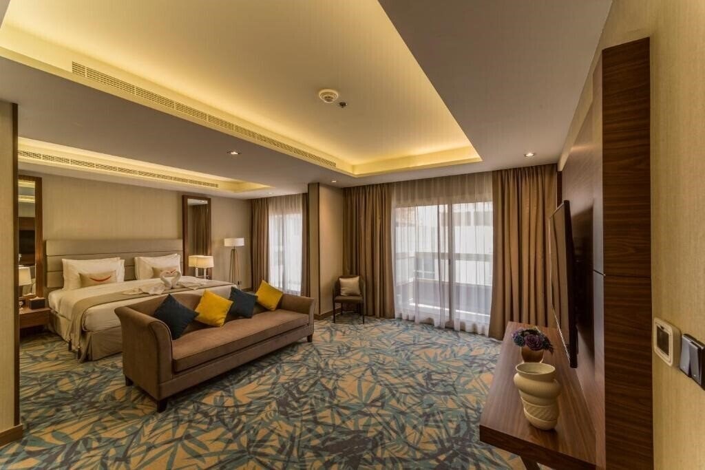 Фотографія Mena Plaza Hotel Al Barsha апартаменты