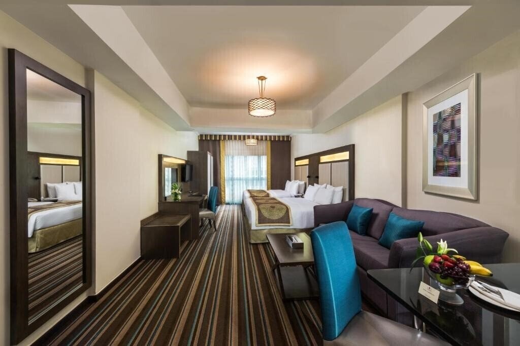 Отель Savoy Central Hotel Apartments (ex. Dar Al Sondos Hotel Apartments By Le Meridien) 4*
