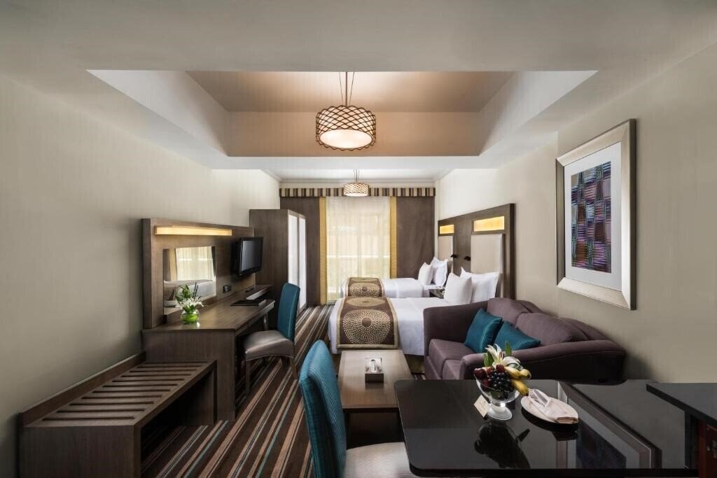 Фото Savoy Central Hotel Apartments (ex. Dar Al Sondos Hotel Apartments By Le Meridien) 4*