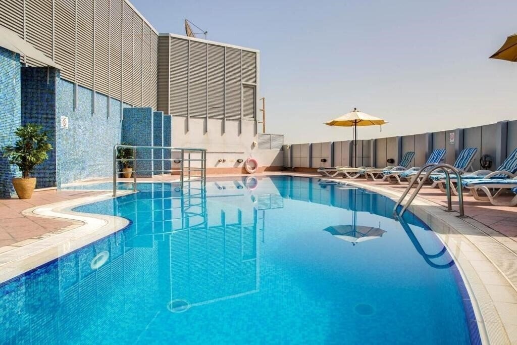 Готель Park Inn By Radisson Hotel Apartments Al Riggga апартаменты