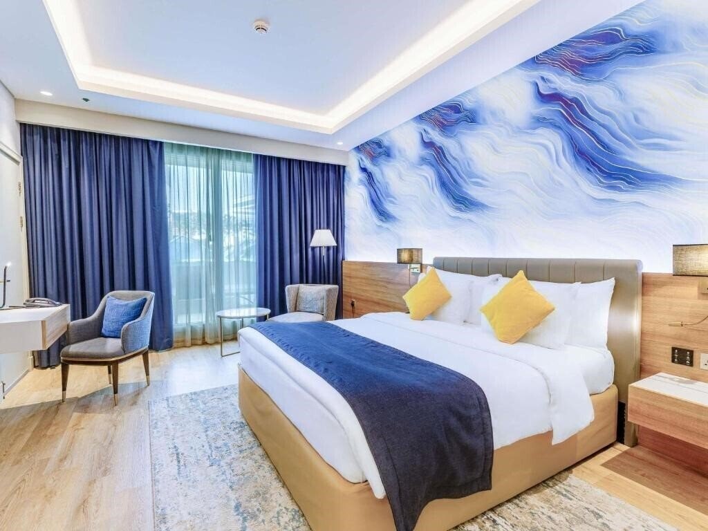 Фотография Movenpick Grand Al Bustan Hotel 5*