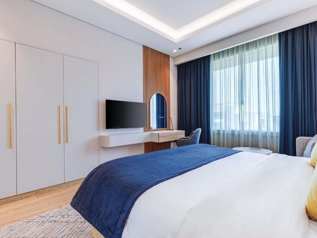 Изображение Movenpick Grand Al Bustan Hotel 5*