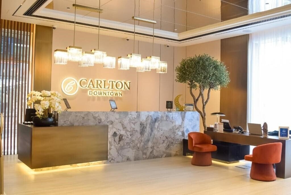 Отель Carlton Downtown 4*
