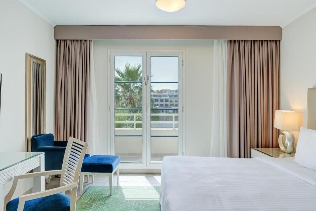 Фото Marriott Executive Apartments Dubai, Green Communi 3*