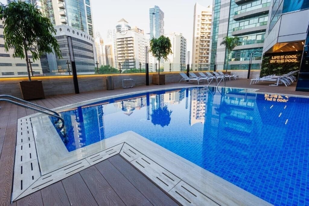 Фотографія Golden Tulip Media Hotel 4*
