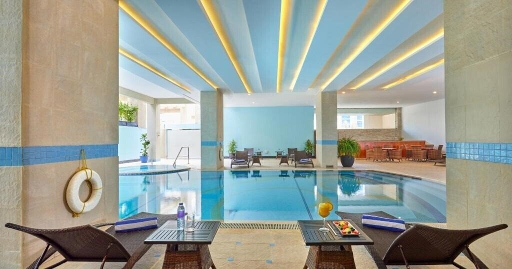 Фотографія Flora Creek Deluxe Hotel Apartments Dubai 5*