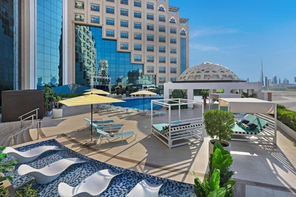Отель Barcelo Al Jaddaf 4*