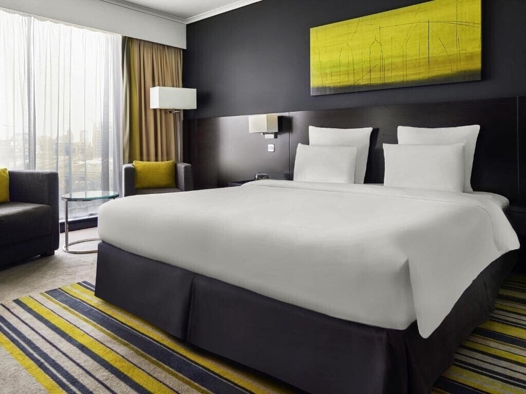 Фото Pullman Dubai Creek City Centre 5*