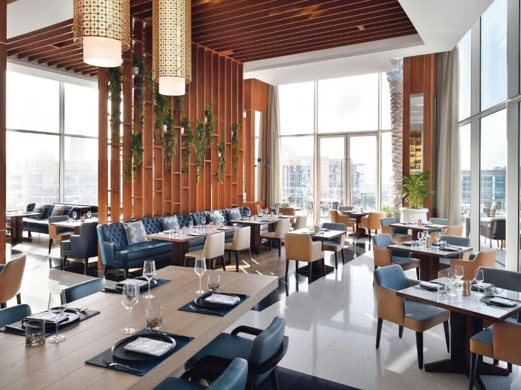 Фото Grand Plaza Movenpick Media City 5*