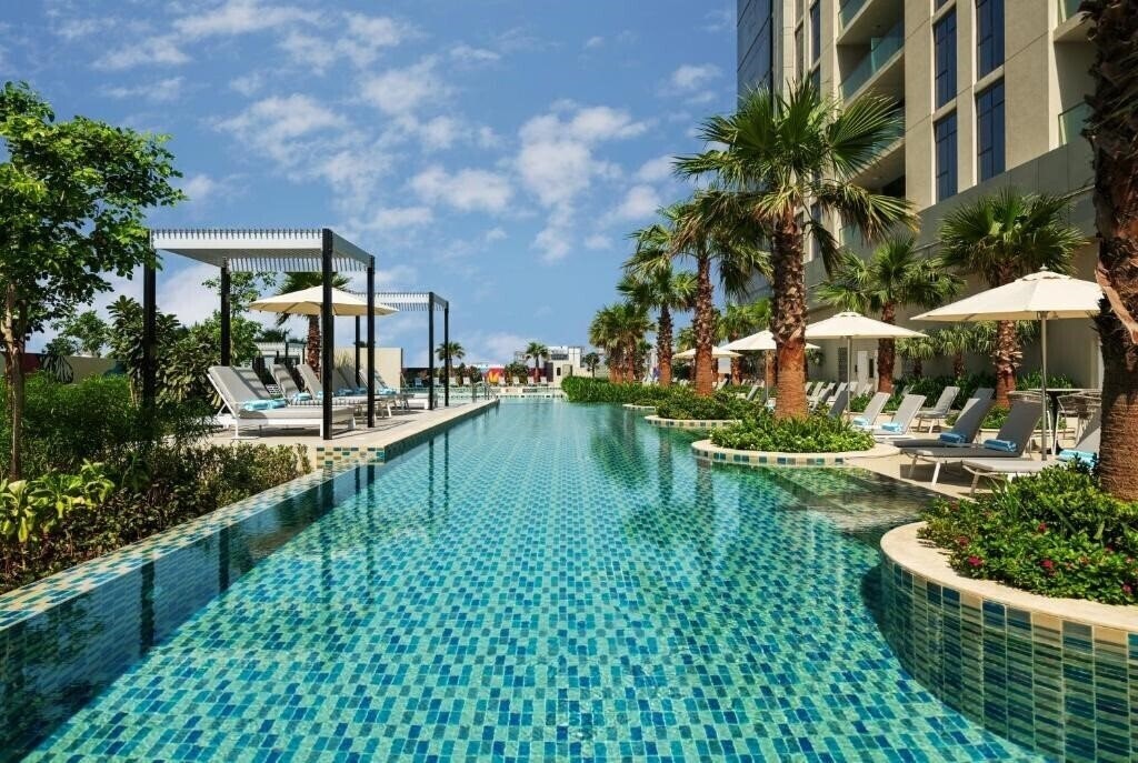 Отель Damac Maison Aykon City Dubai 4*