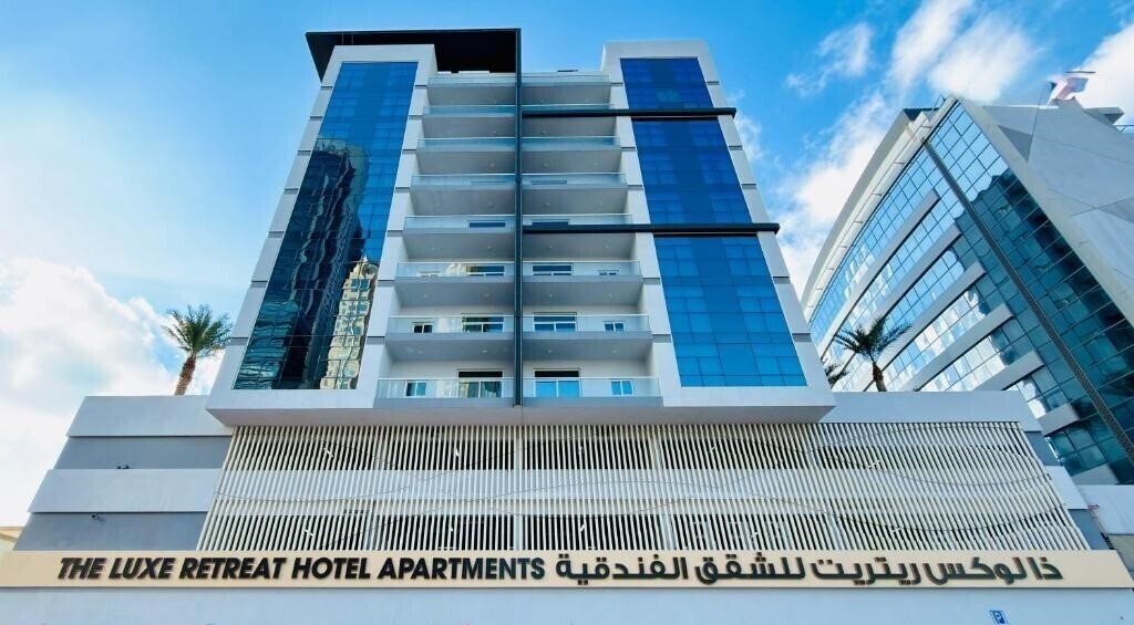 Отель The Luxe Retreat Hotel Apartment 4*