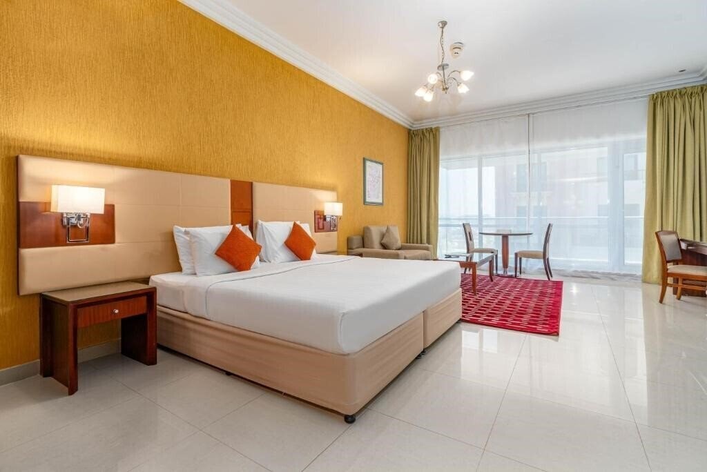 Отель Star Metro Deira Hotel Apartments апартаменты