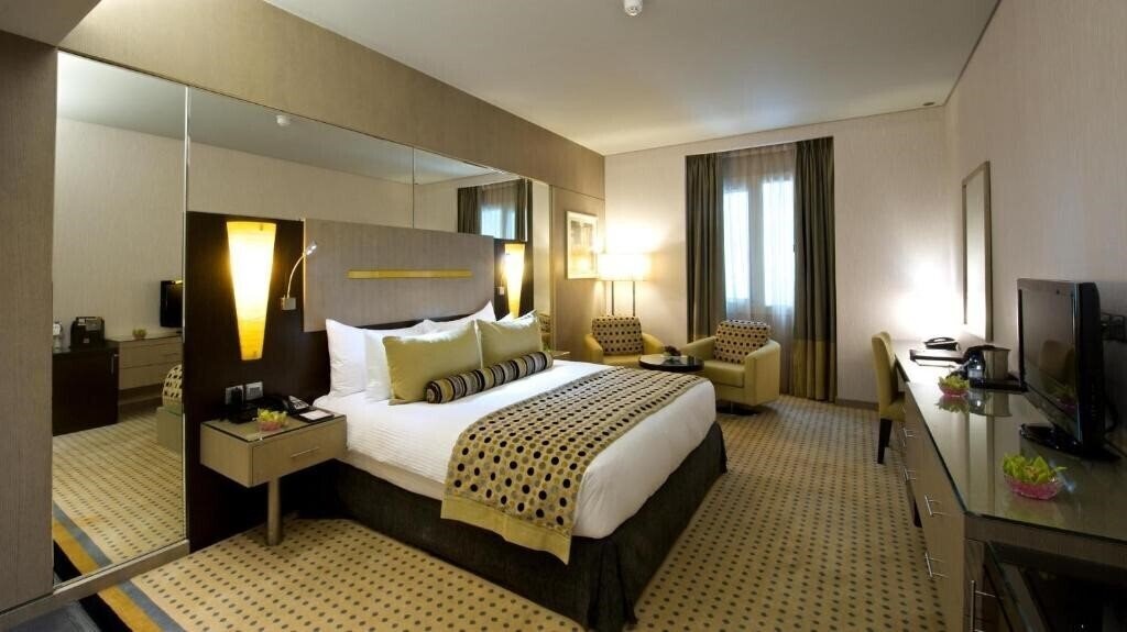 Фото Time Grand Plaza Hotel 4*