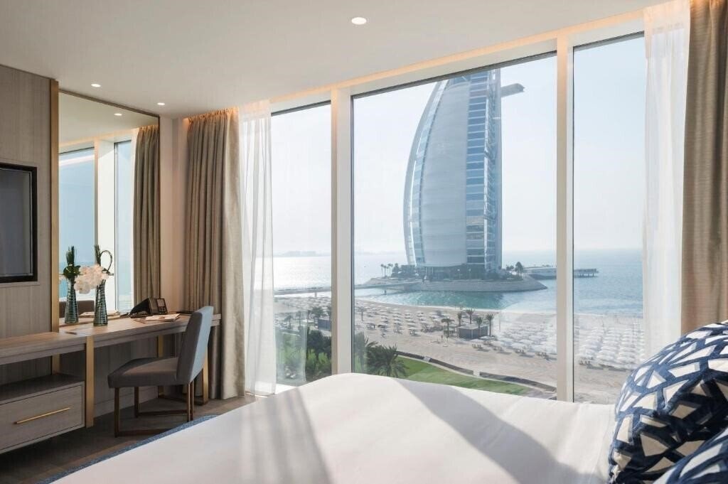 Фото Jumeirah Beach Hotel (ex. Beach Hotel, Jumeirah Beach Hotel & Beit Al Bahar Villas) 5*