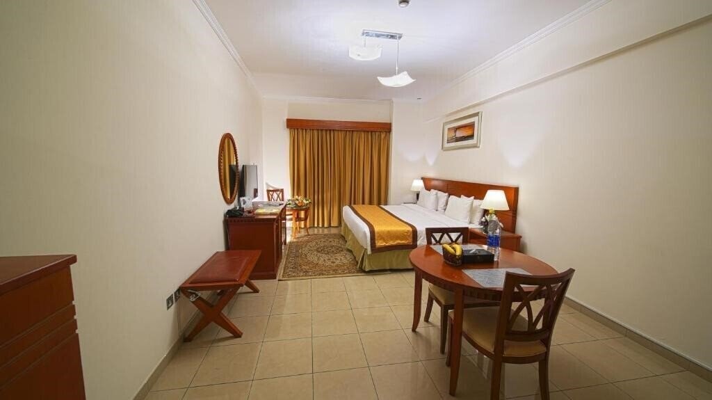 Фото Rose Garden Hotel Apartments 3*