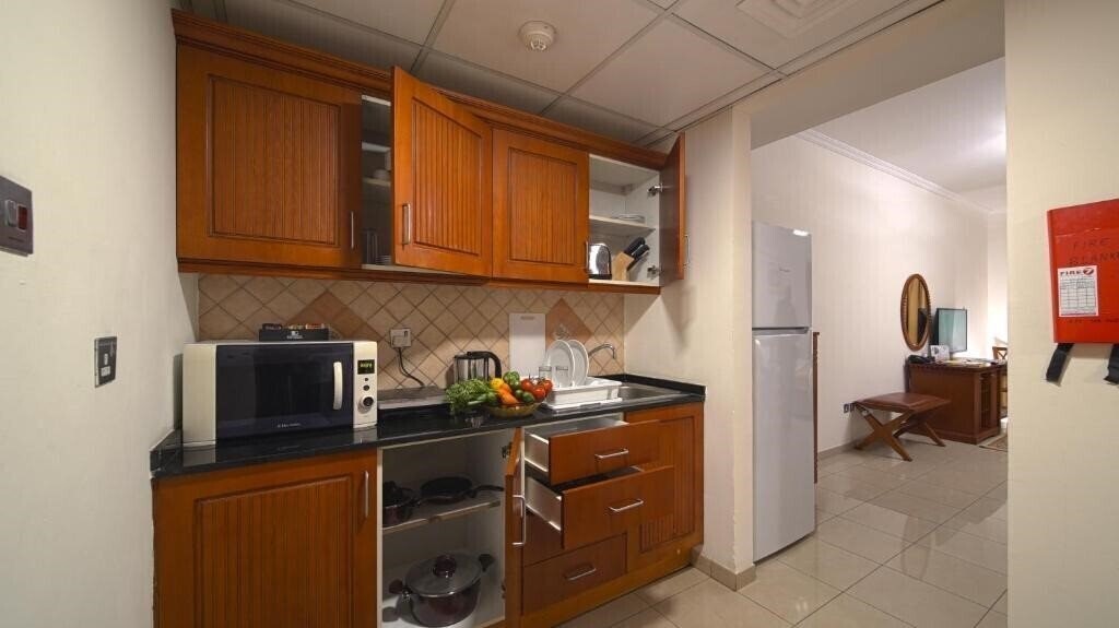 Фотографія Rose Garden Hotel Apartments 3*