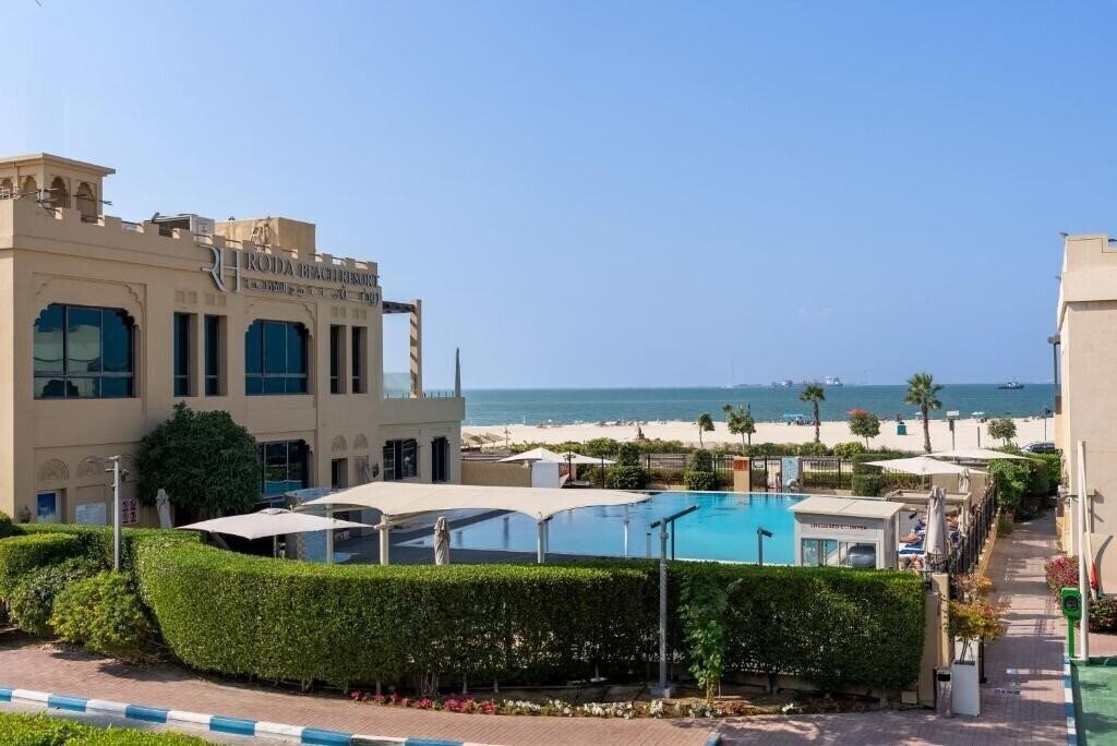 Отель Roda Beach Resort 4*
