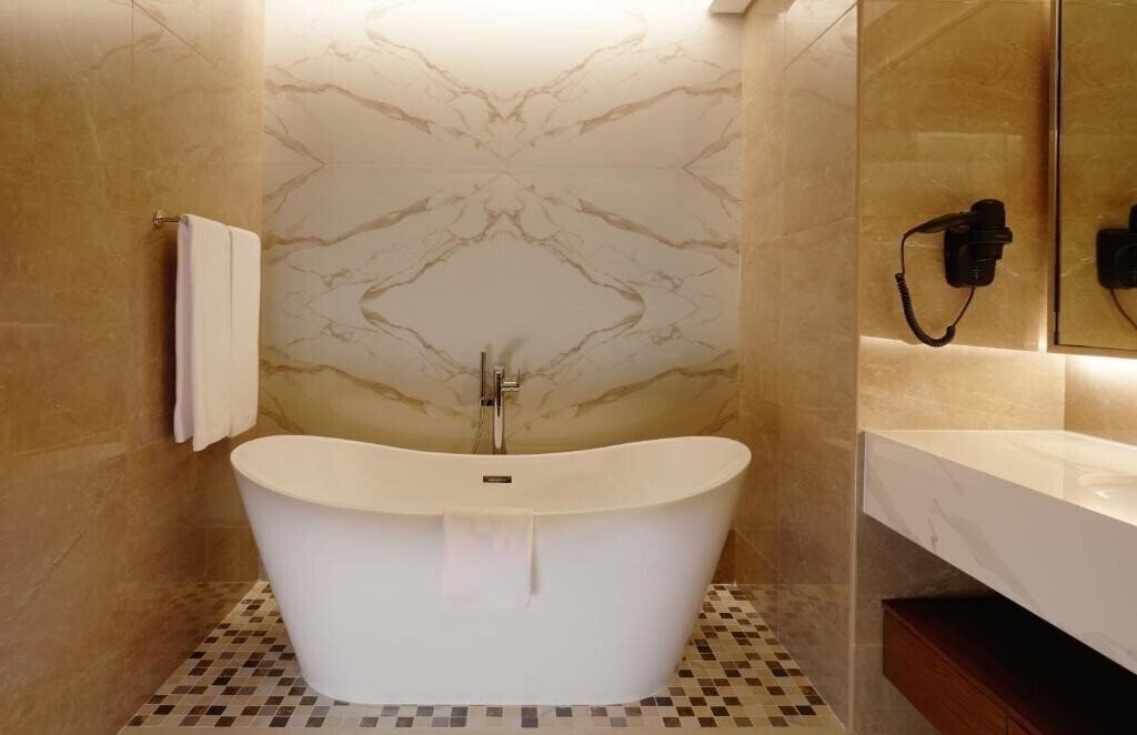 Фотографія Royal M Hotel & Resorts Al Aqah Beach 5*