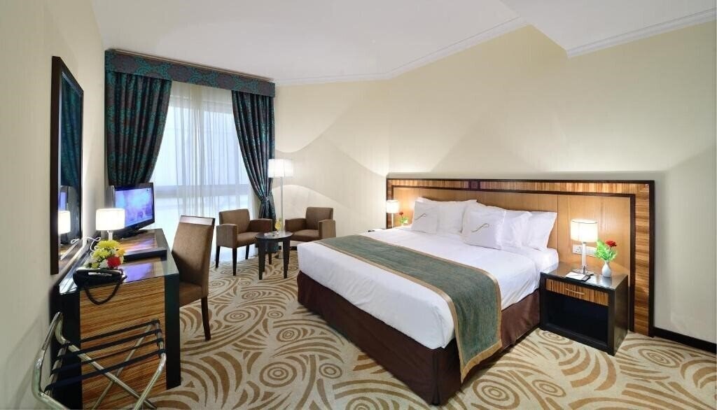 Готель Al Majaz Premiere Hotel Apartments апартаменты