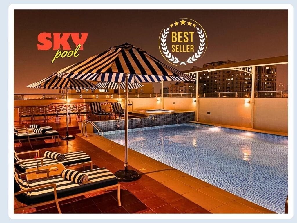 Готель Al Hamra Hotel 4*