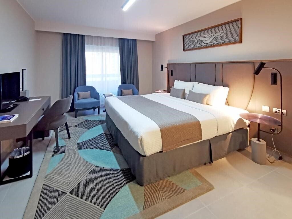Фотография Holiday International (ex. Holiday International Hotel) 4*