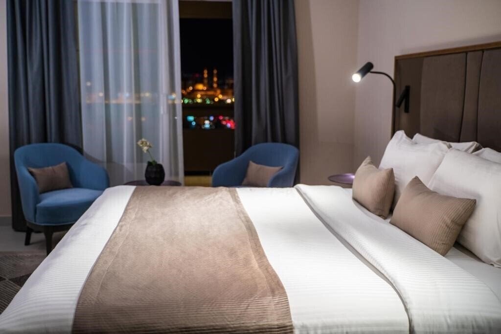 Изображение Holiday International 4*
