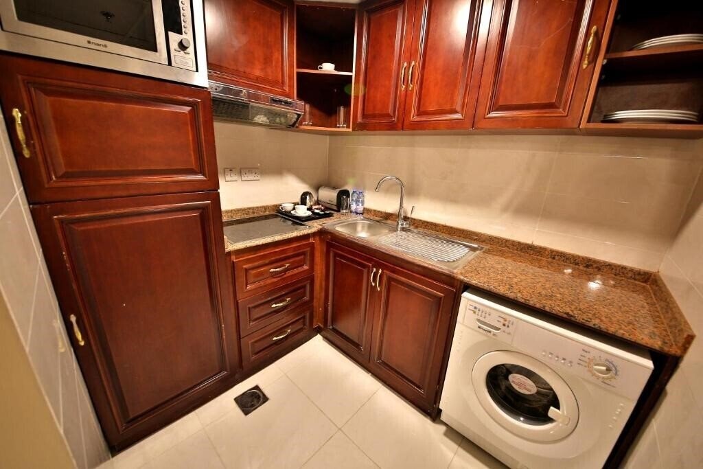 Фотографія Midtown Furnished Apartments 3*