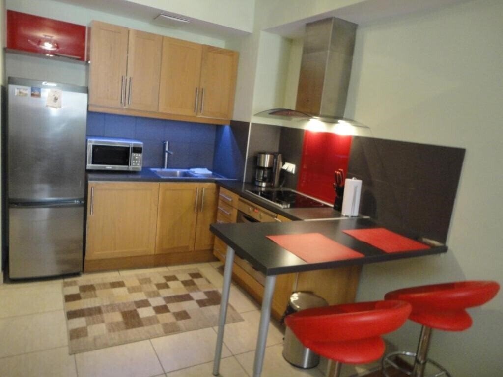 Фотографія Angel Plaza Apartments 4*