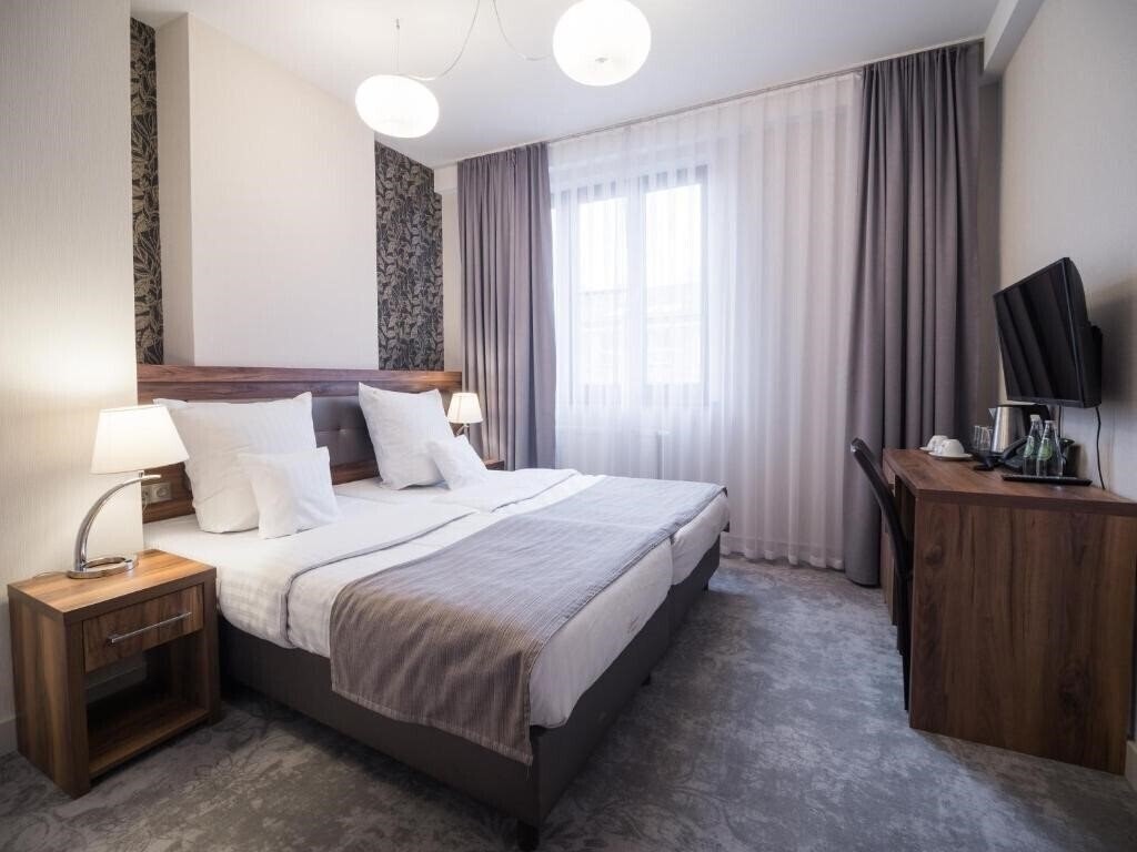 Фото Hotel Miodowa 3*