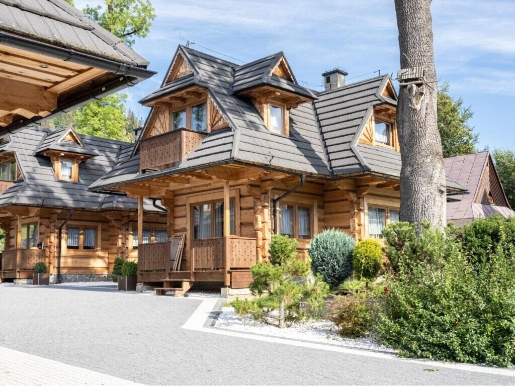 Фотографія Cottage Osada Harenda коттедж