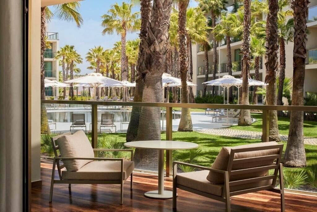 Фото Salgados Palm Village Apartments & Suites 4*