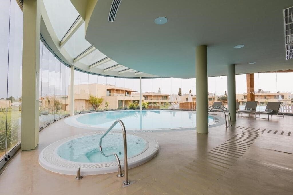 Фотографія White Shell Beach Villas 4*