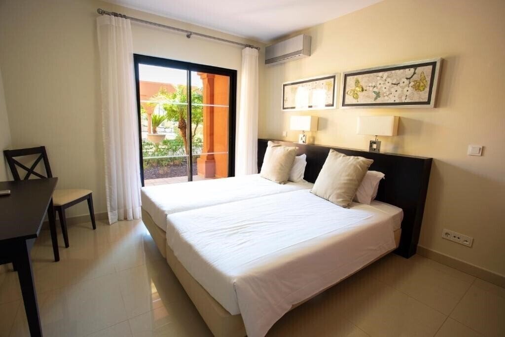 Фото Amendoeira Golf Resort 4*