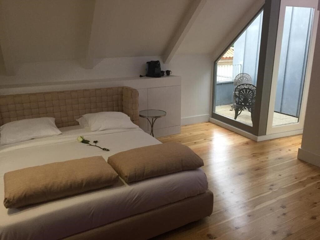Готель Solar Do Castelo 4*
