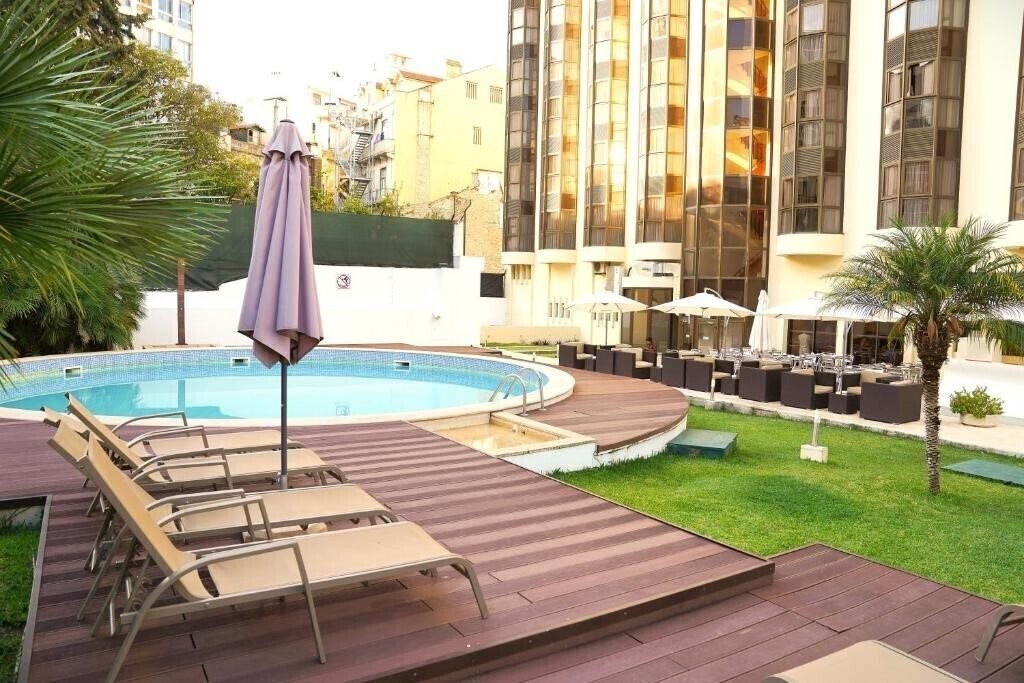 Отель Legendary Lisboa Suites 4*