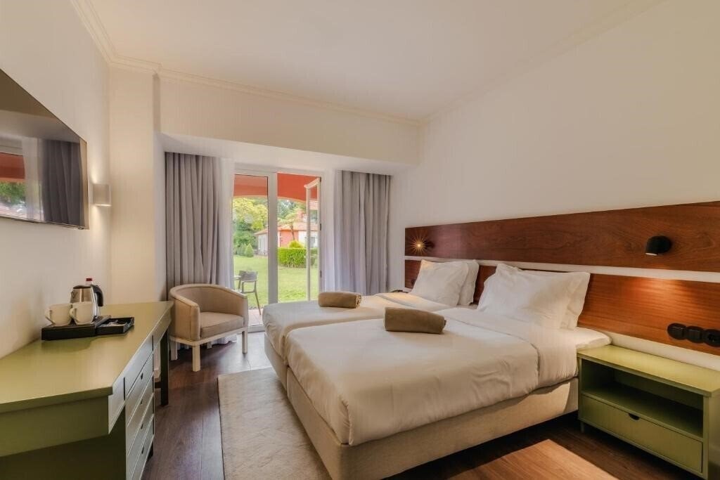 Фото Enotel Santo da Serra 4*