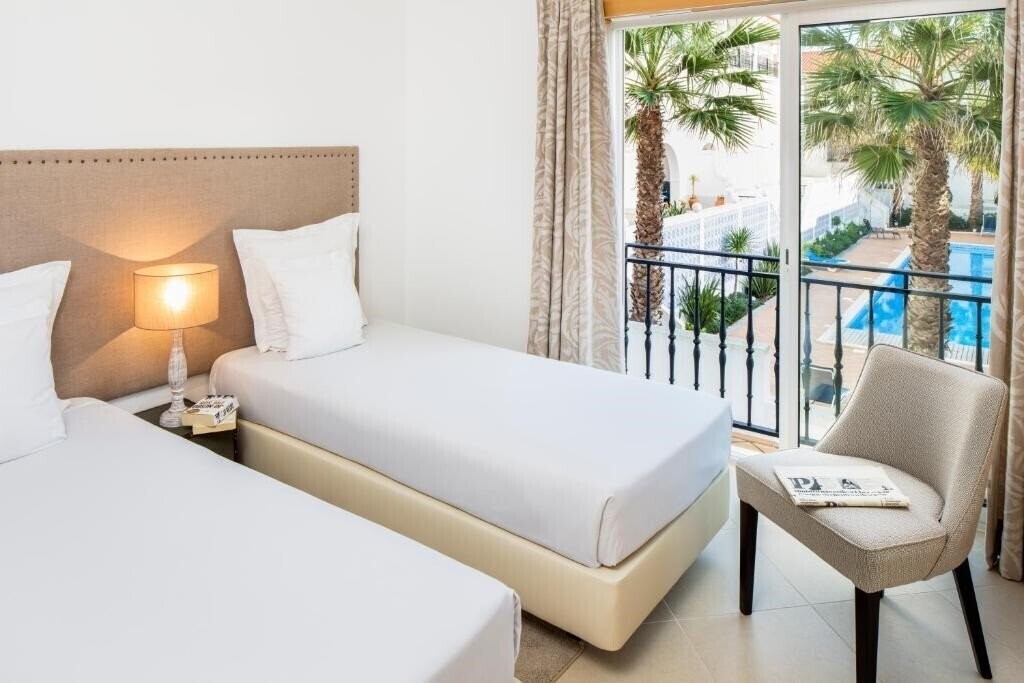 Фото The Village Praia d’el Rey 4*