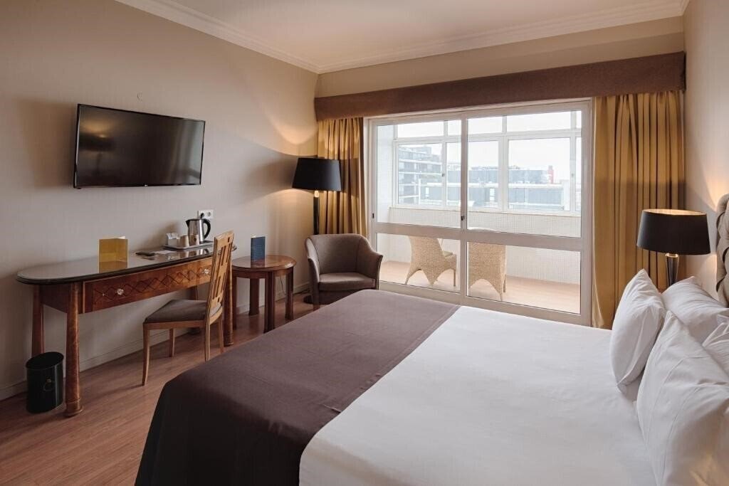 Фото Golden Tulip Porto Gala 4*