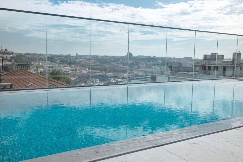 Отель NH Porto Jardim 4*