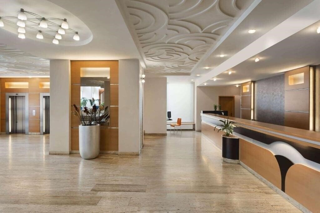 Фотографія Ramada by Wyndham Bucharest Parc Hotel 4*