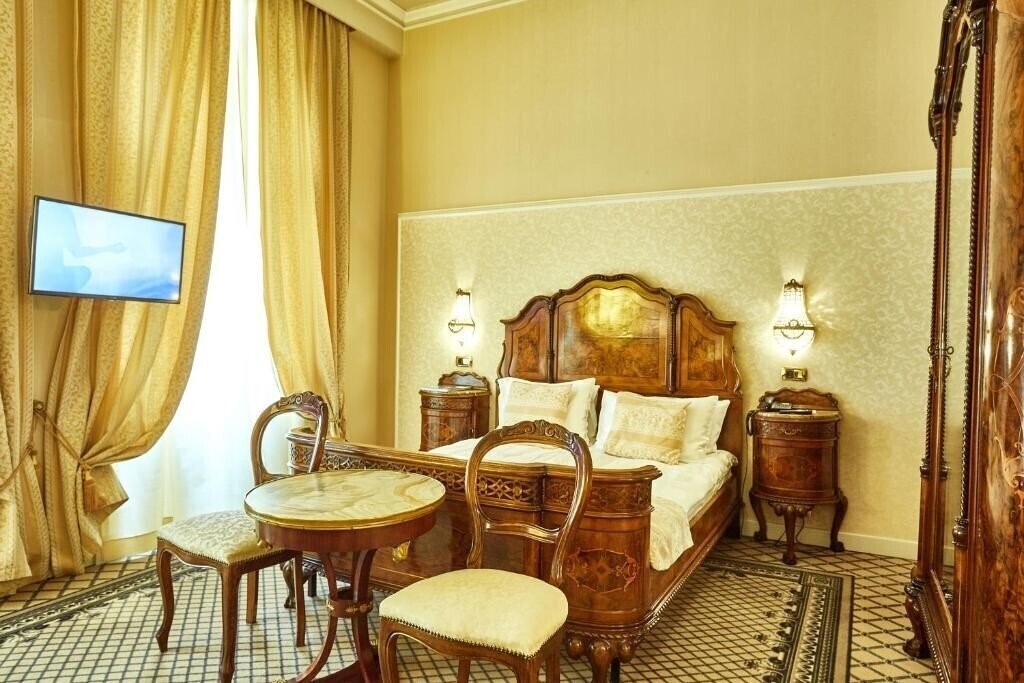 Фотография Grand Hotel Continental 5*