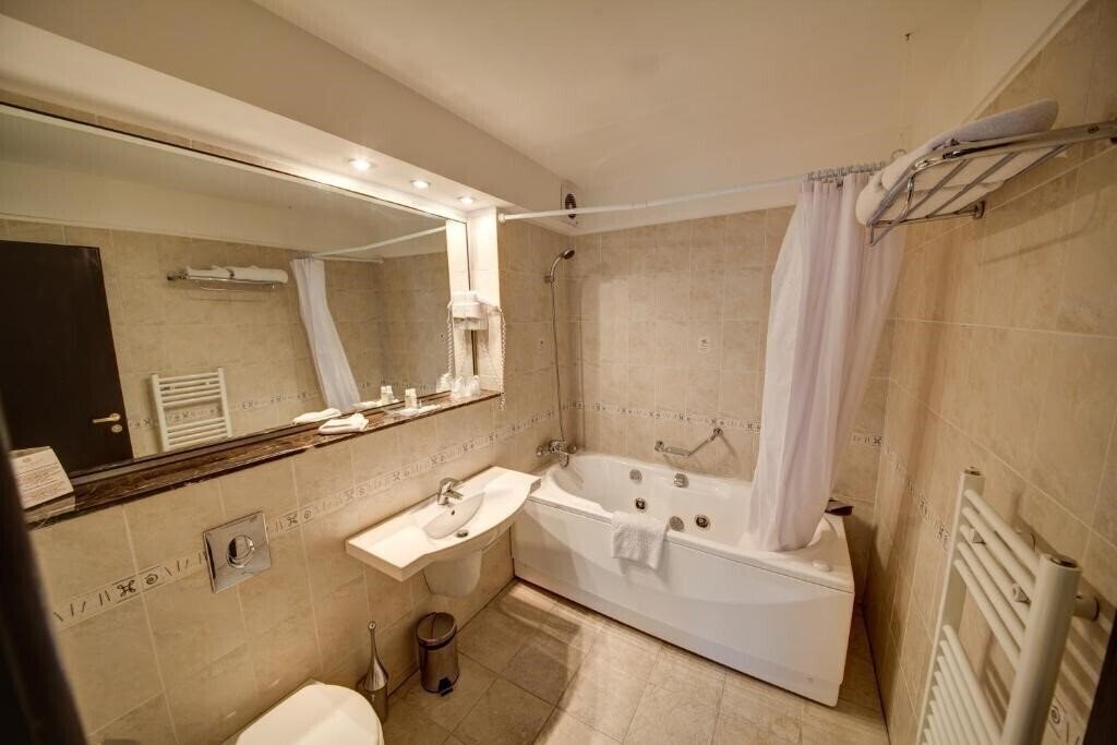 Фотографія Atrium Hotel Ateneu City Center 4*