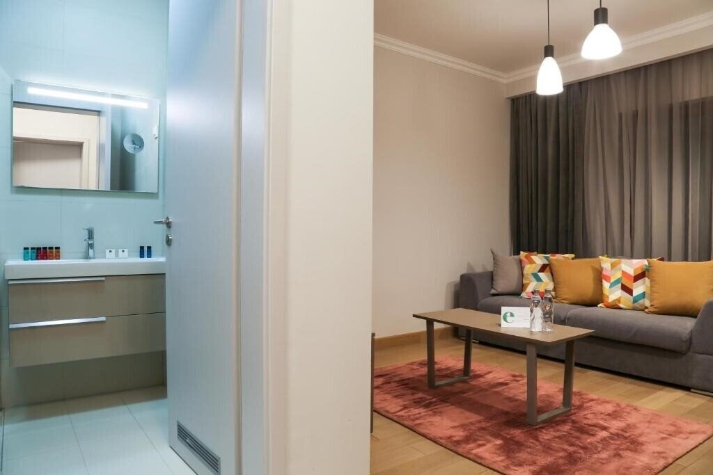 Фотографія Expecto Apartments (ex. Elexus Apartments) 3*