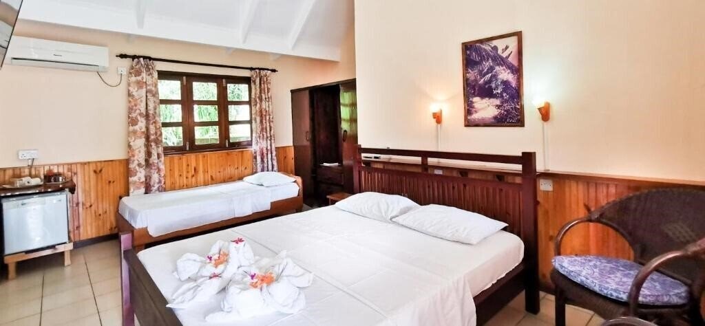 Фотографія Bernique Guesthouse 3*