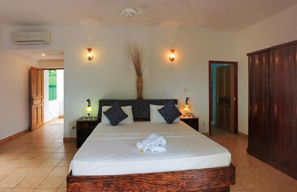 Фото Divers Lodge Guest House 3*