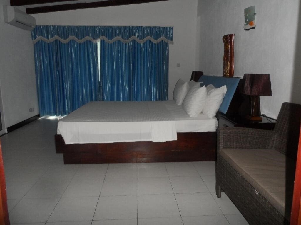 Фото Anse Norwa Self Catering Apt апартаменты
