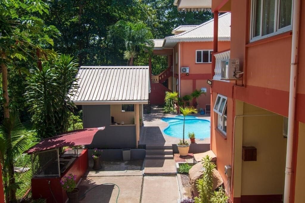 Фото Reef Holidays Apartments 4*