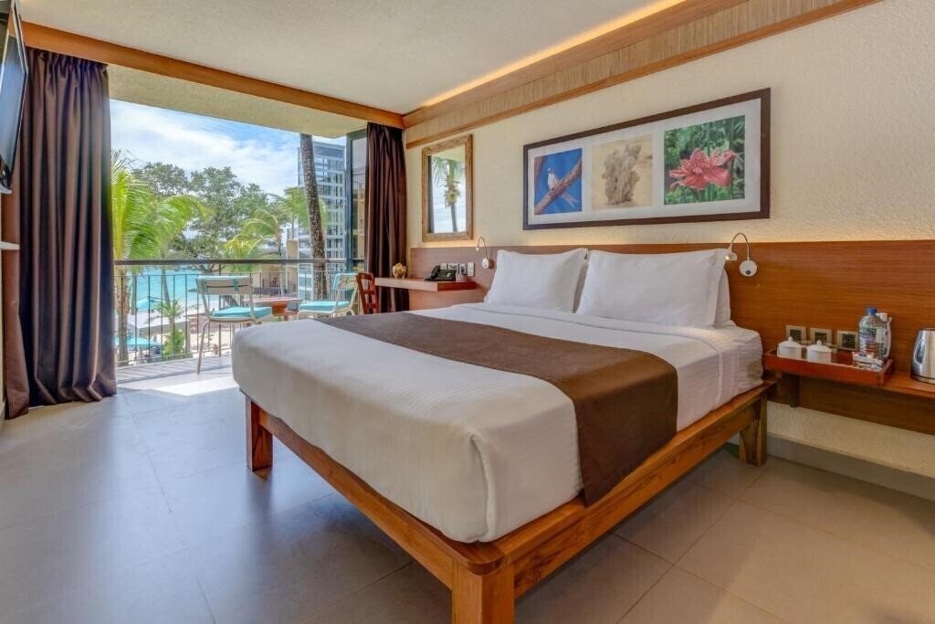 Фото Coral Strand Hotel 4*